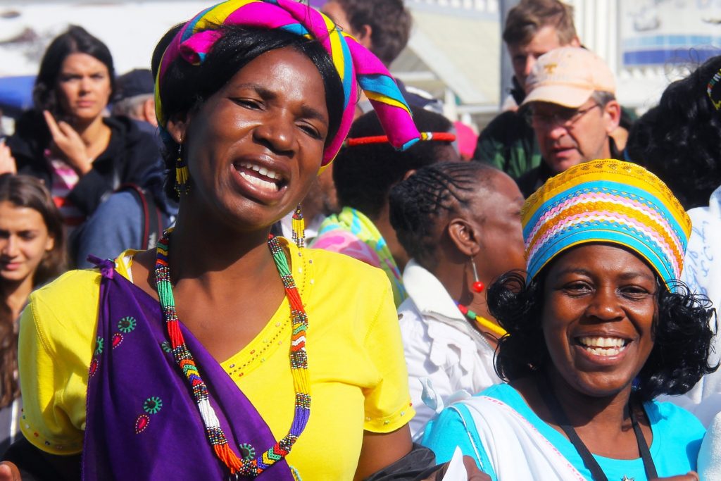 Two African women smiling